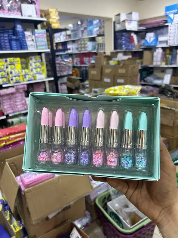 صورة 2 — علبة قلم جاف شكل روج مية جليتر